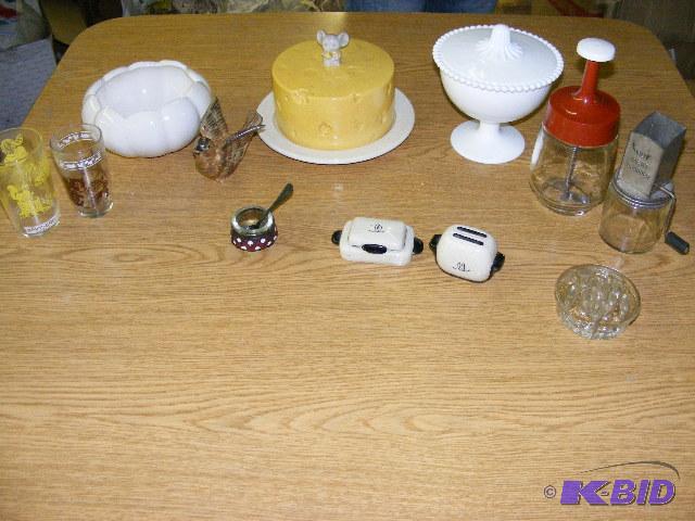 two older nut grinders, covered cheese platte...