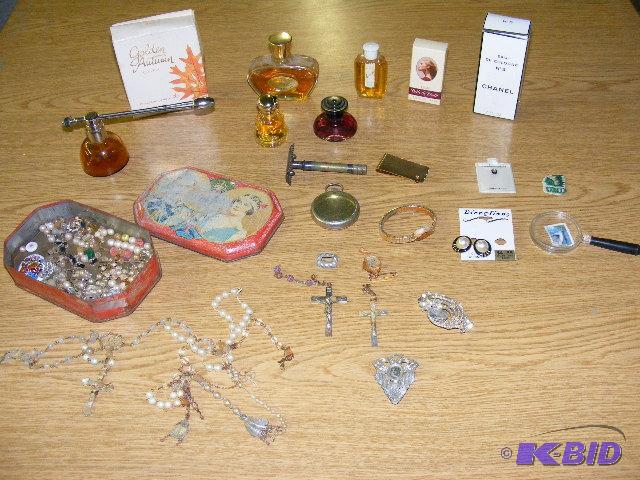 lot of perfumes and misc jewelry pieces