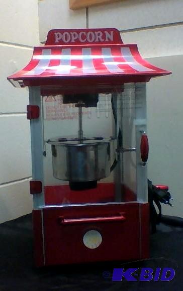 lot 21 image: Look a like Old Fashioned Counter Top Popcorn Popper.  Cracked plastic window.  Does not affect use.