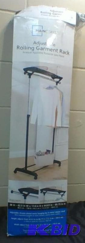 lot 23 image: Mainstays Adjustable Rolling Garment Rack.  Customer Return.  Box Open.  All there.