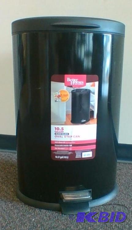lot 29 image: Better Homes and Gardens 10.5-Gallon Oval Trash Can.  Gloss Black Small dents.  See Pics