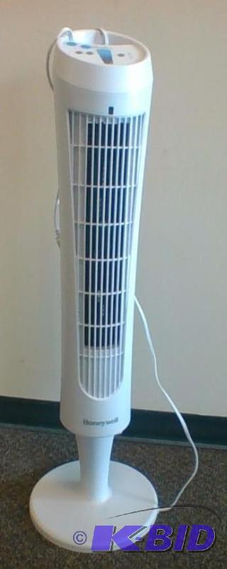 lot 31 image: Honeywell QuietSet Whole Room Tower Fan, White.  Tested Works.  Only turns one way.