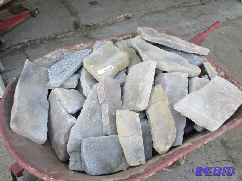 lot 100 image: Wheel barrow load of stone, wheel barrow not ...