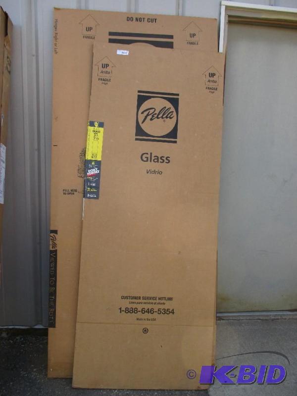 lot 109 image: New Pella storm door, 32" wide...