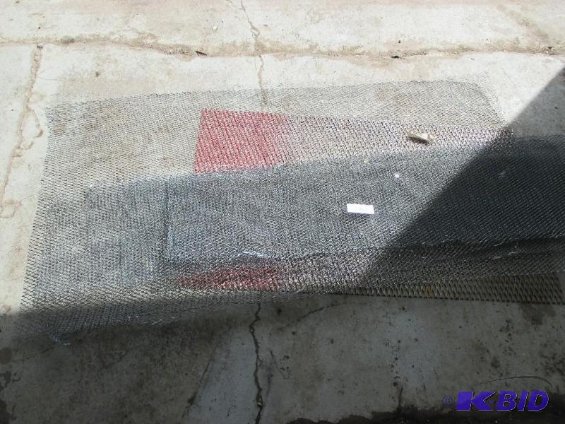 lot 141 image: pile of stone mounting metal mesh...