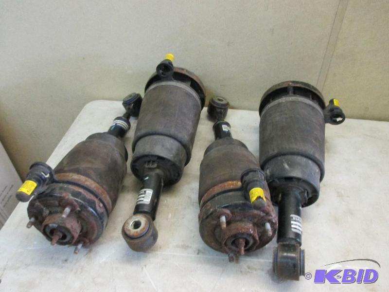 lot 143 image: 4 air shocks of 06 Lincoln navigator, shocks ...