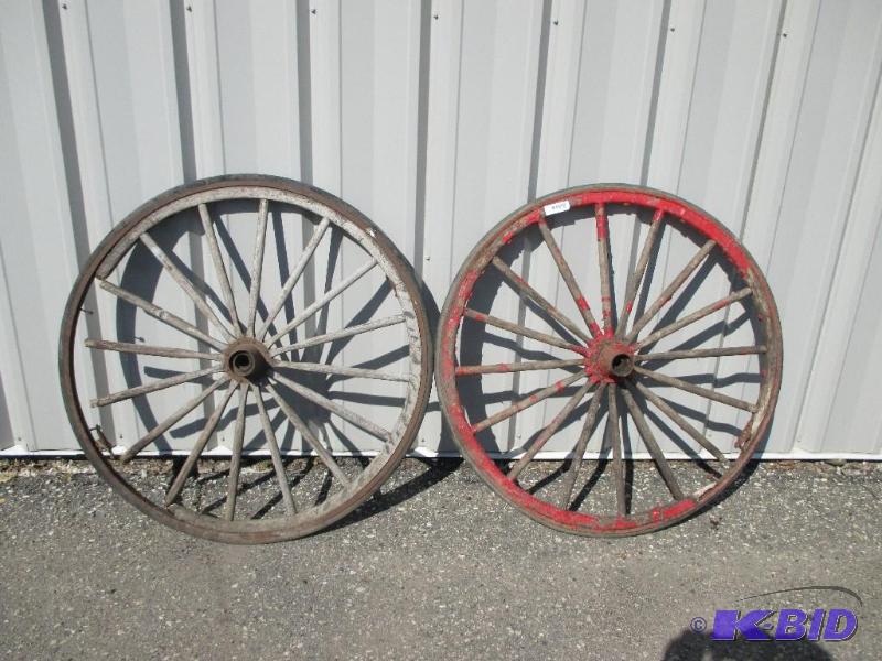 lot 29 image: Antique wood wagon wheels...