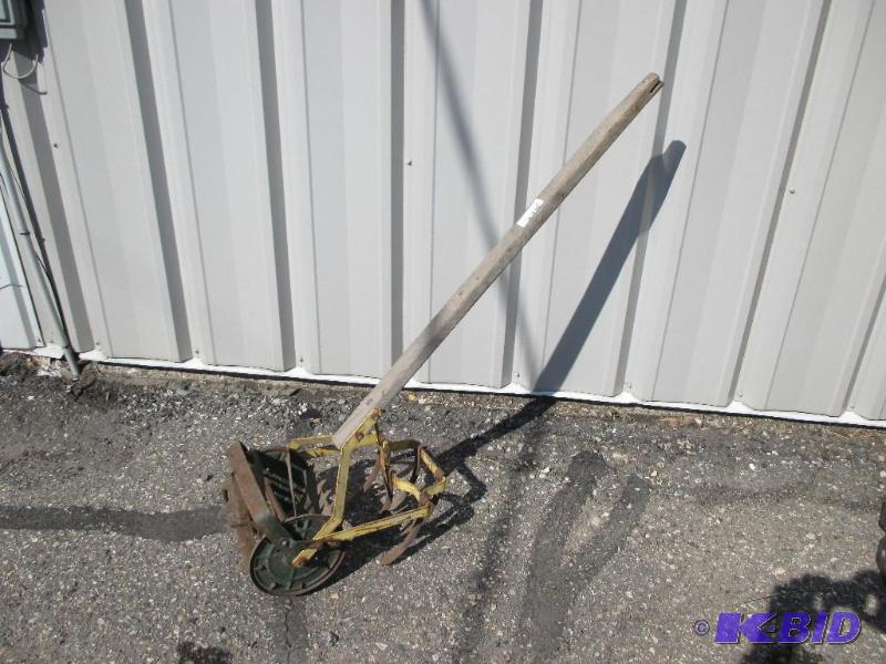 lot 33 image: Antique garden tiller...