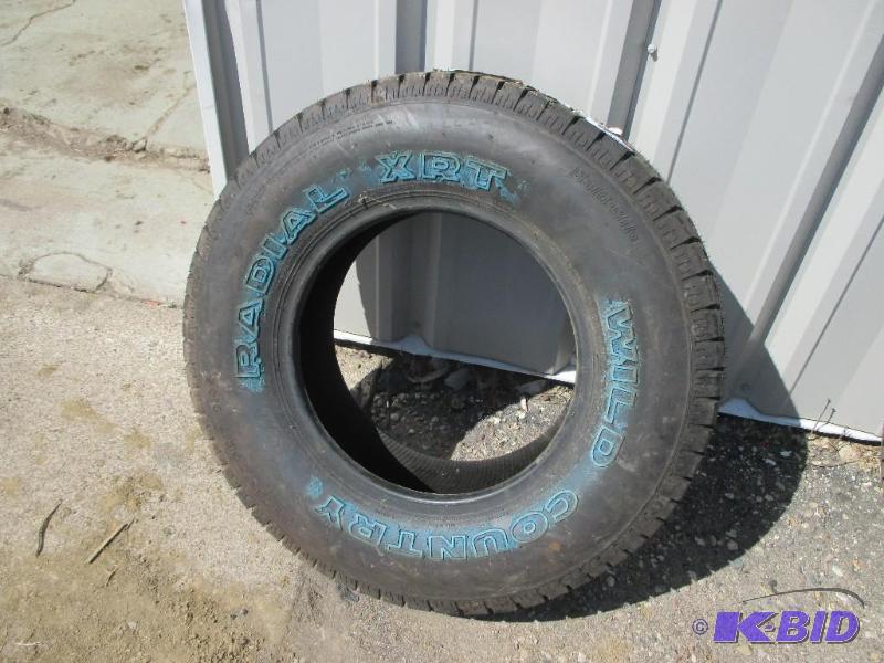 lot 55 image: 1 New Wild Country XRT Tire LT23575R15...