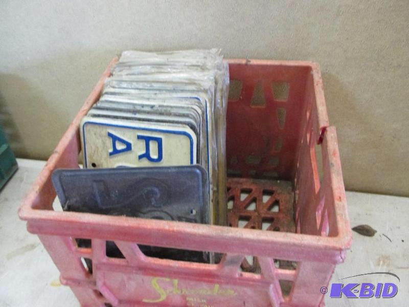lot 79 image: tote of mostly new license plates...