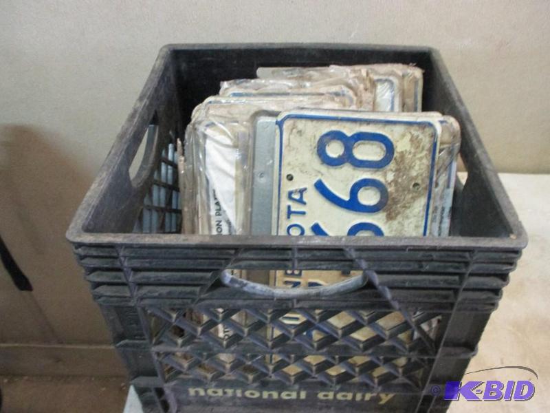 lot 87 image: tote of mostly new license plates...