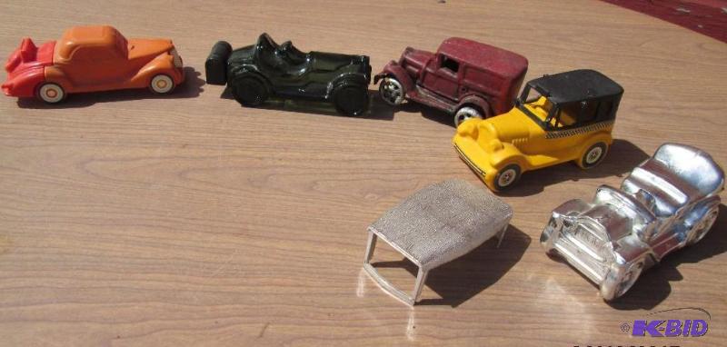 lot 12 image: lot of vintage old car shaped cologne bottles...