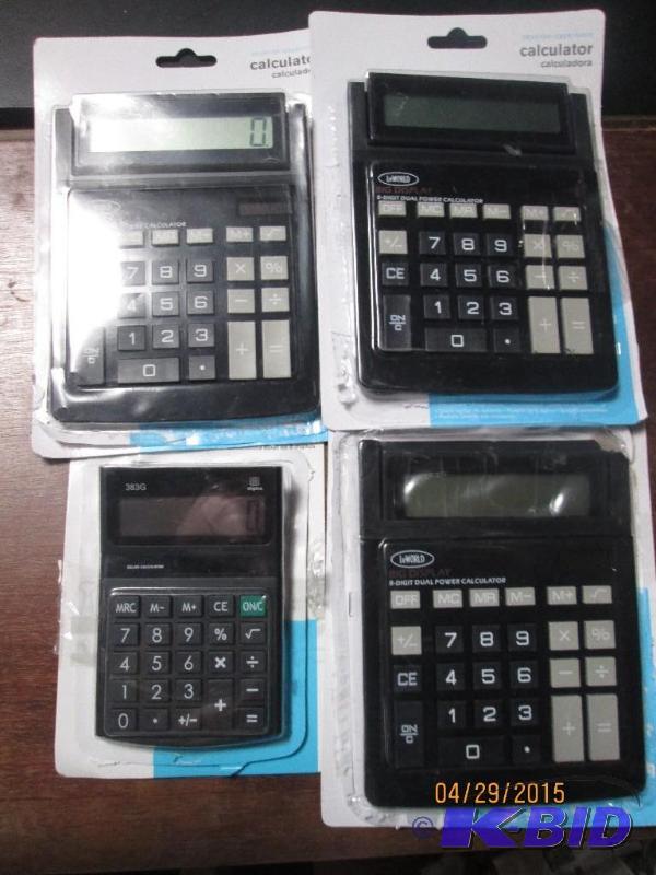 lot 189 image: Lot of 4 desktop solar calculators. New in pa...