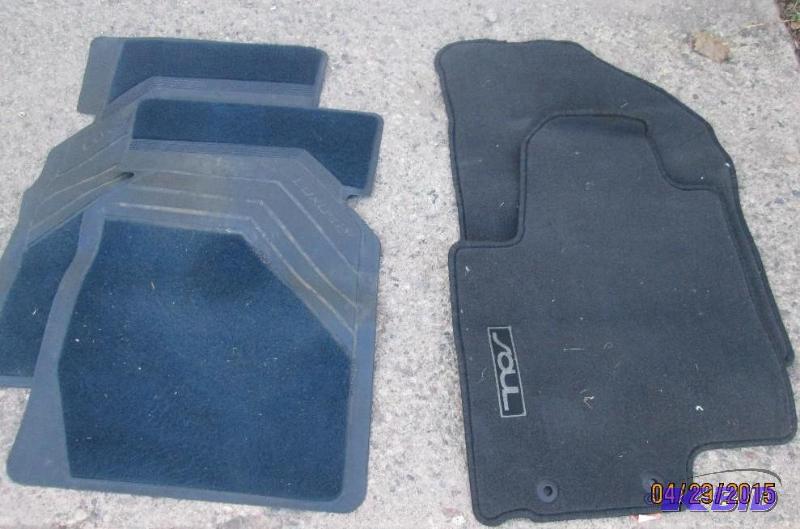lot 229 image: 2 pair of car mats. 1 blue, the other black. ...