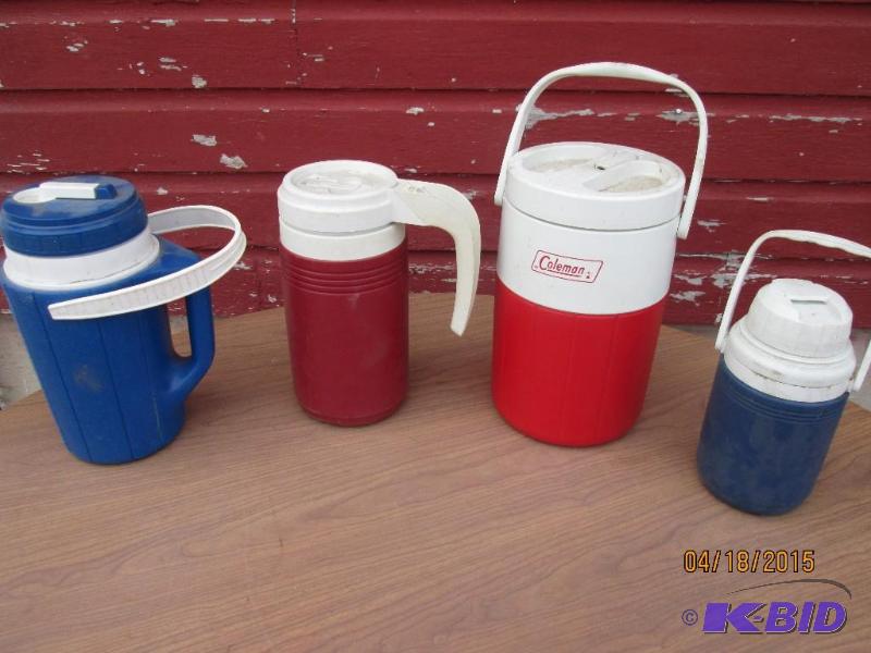 lot 31 image: four cold drink holders...
