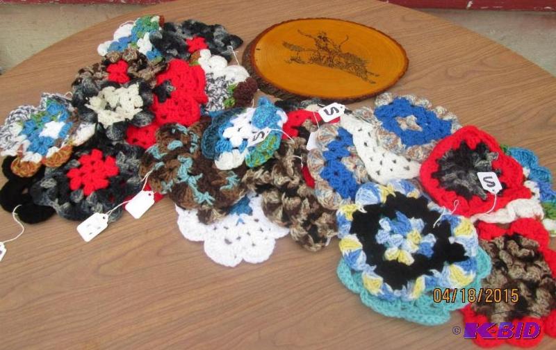 lot 43 image: pot holders and wooden wall hanging...