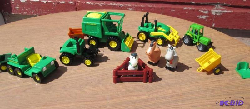 lot 8 image: lot of John Deer tractor toy tractors, trailo...