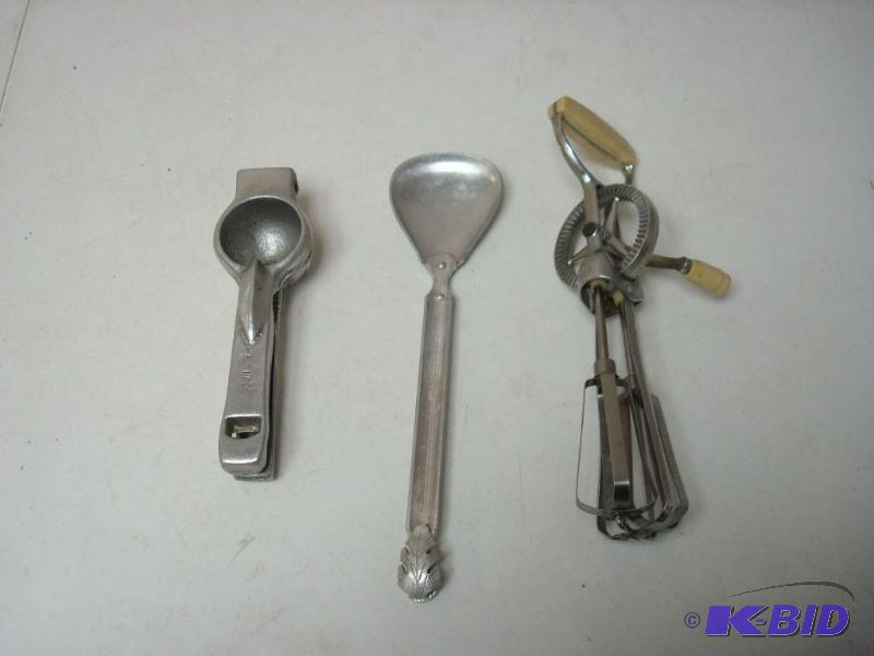 lot 100 image: Three Metal Kitchen Items, Egg Beater, Juicer...