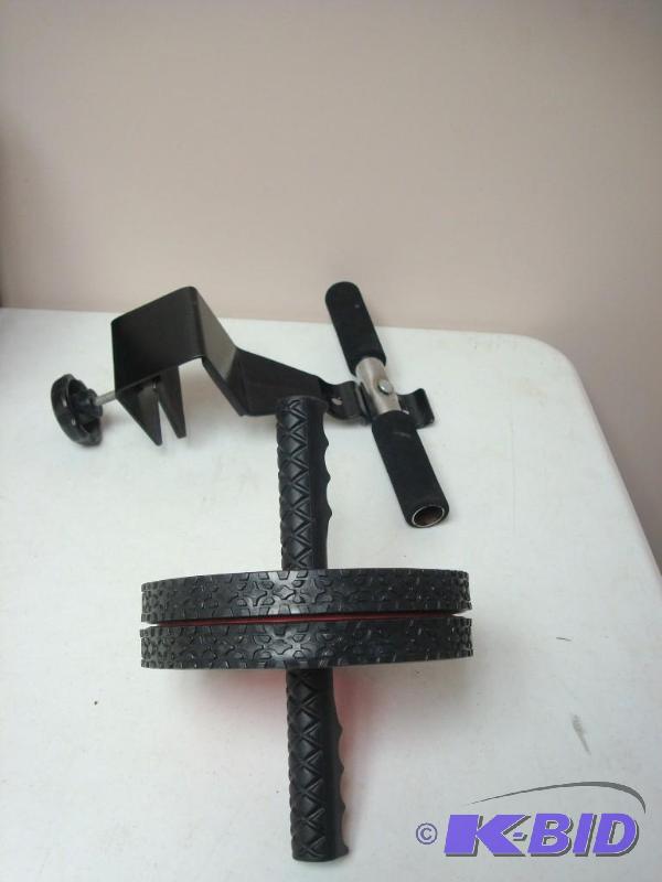 lot 104 image: Door Sit Up Stand And Wheel Roller...