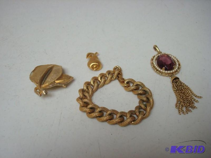 lot 123 image: Lot Of Gold Tone Jewelry, One Trifari Pear...