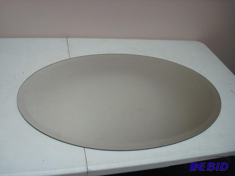 lot 46 image: Large Oval Mirror...