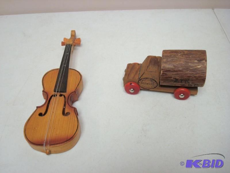 lot 56 image: Redwood Log Toy Truck And Small Toy Violin&nb...