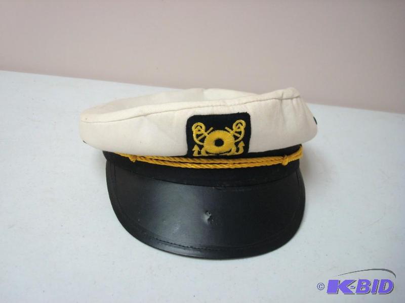 lot 61 image: Captains Hat, Some Wear...