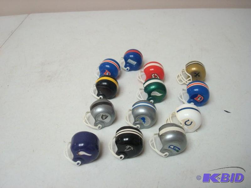 lot 67 image: Lot Of Tiny Football Helmets...