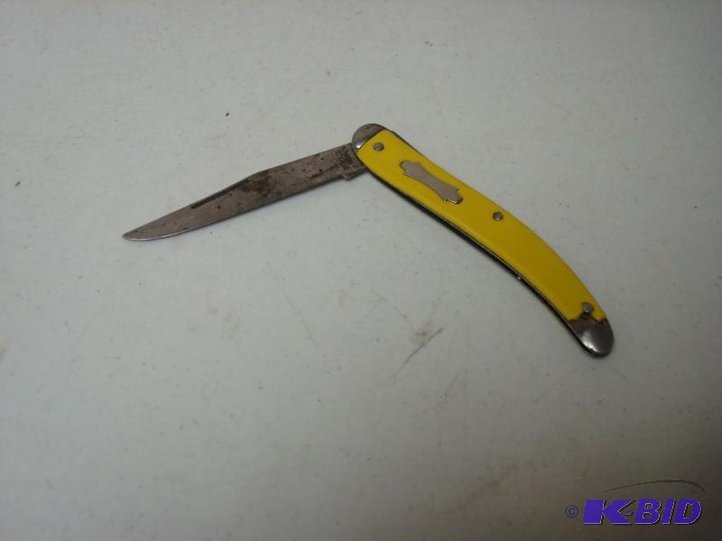 lot 74 image: Yellow Folding Knife, Some Wear...