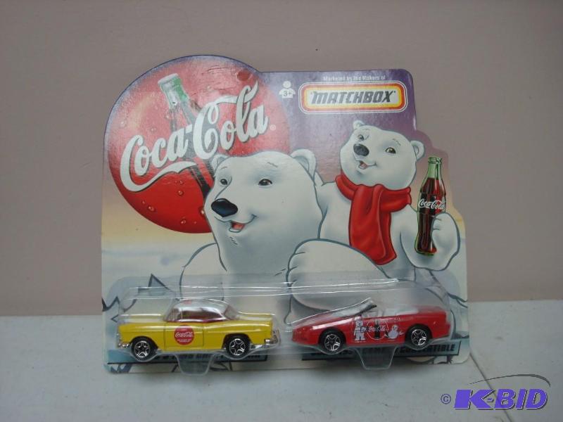 lot 80 image: New Matchbox Coca Cola Cars...