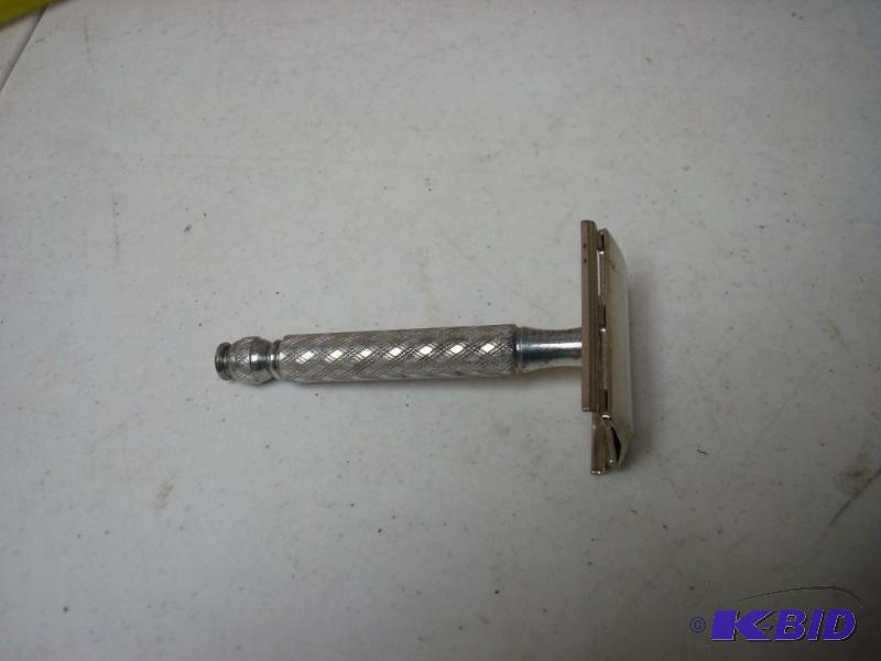 lot 82 image: Metal Gillette Razor...