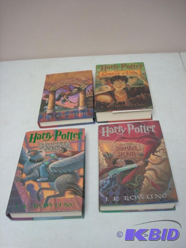 lot 93 image: First Four Harry Potter Hard Cover Books...