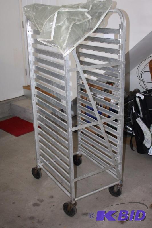 lot 10 image: Metal Baking Rack wWheels 20 Racks 20 x 28 x 64.