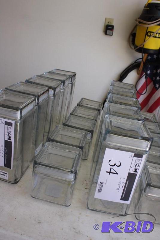 lot 34 image: Lot of (10) Glass Jars wSeal-Tite Lids 4 x 4 x 4, app. 5 ct 4 x 4 x 8, app. 5 ct.