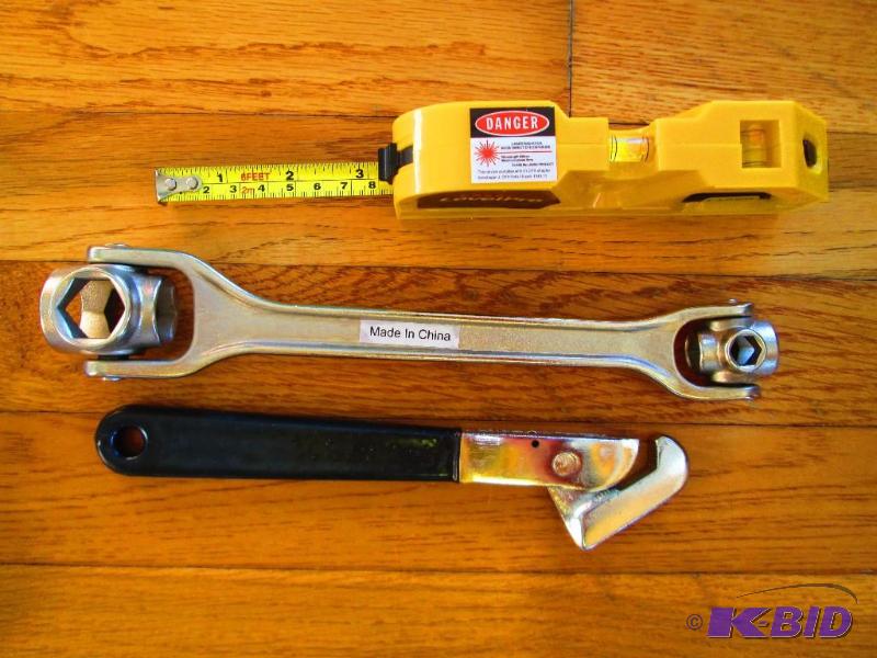 lot 104 image: Lot of new tools, laserlevel with tape measur...