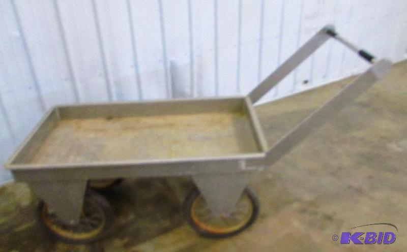 lot 105 image: Very sturdy cart made from stainless steel on...
