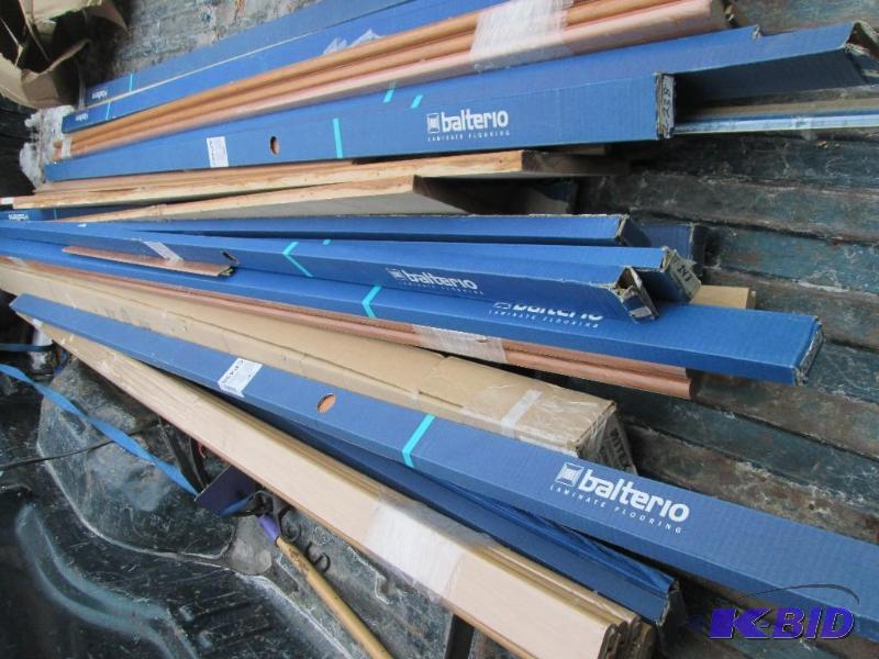 lot 112 image: Large lot of carpet and other flooring transi...