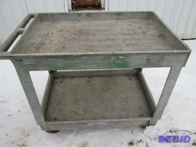lot 113 image: Rubbermaid commercial grade plastic cart on w...
