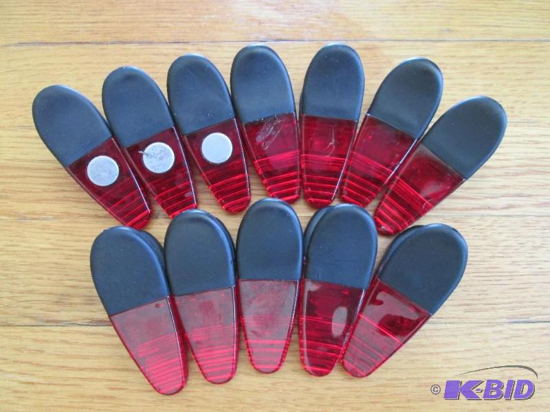 lot 119 image: Lot of 12 magnetic clips, with rubber grip ha...