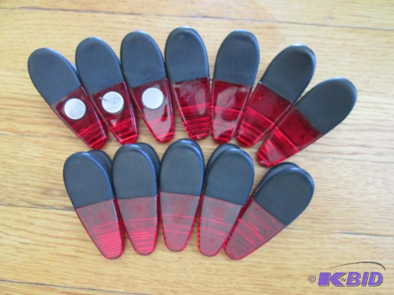 lot 120 image: Lot of 12 magnetic clips, with rubber grip ha...