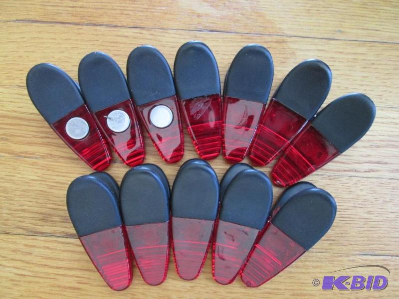 lot 122 image: Lot of 12 magnetic clips, with rubber grip ha...