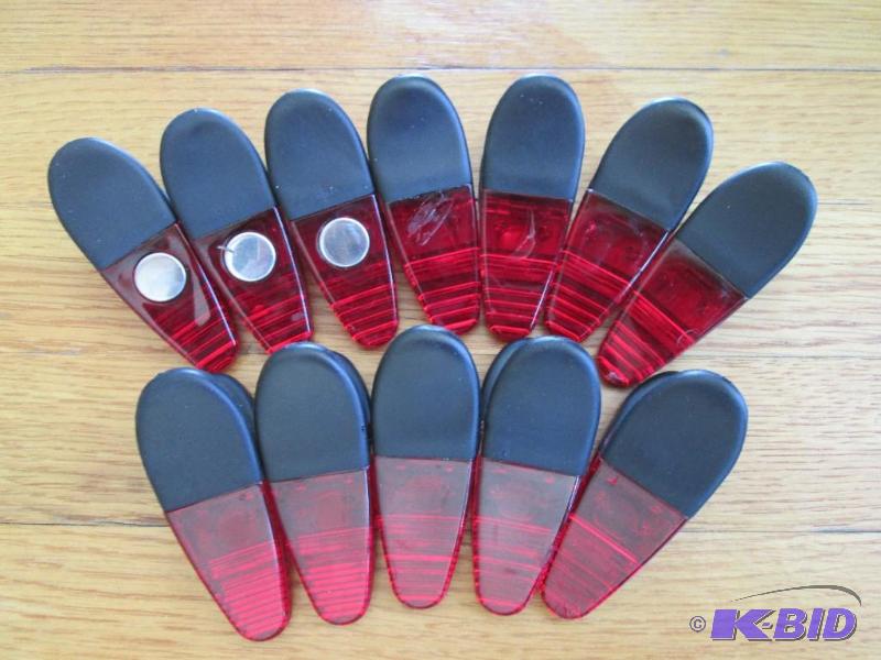 lot 124 image: Lot of 12 magnetic clips, with rubber grip ha...