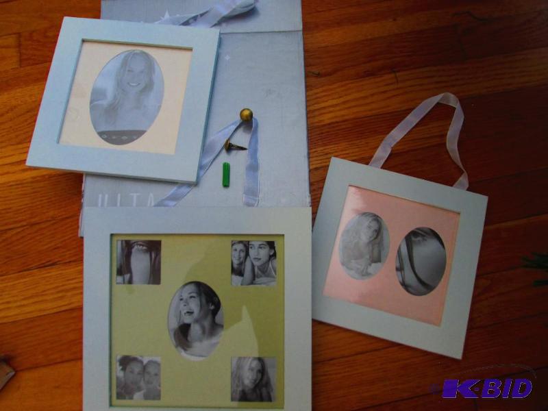 lot 128 image: Set of three nice new photo frames with ribbo...