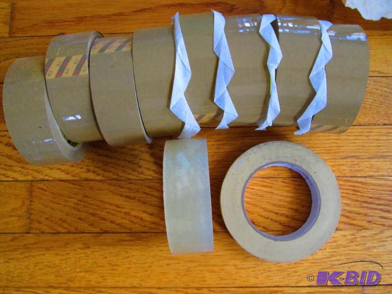 lot 238 image: 8 rolls tan and 1 roll of clear 3M Scotch pac...