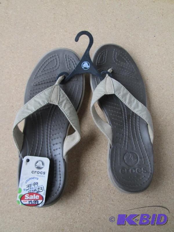 lot 26 image: Brand new pair of Crocs size 10 sandals...