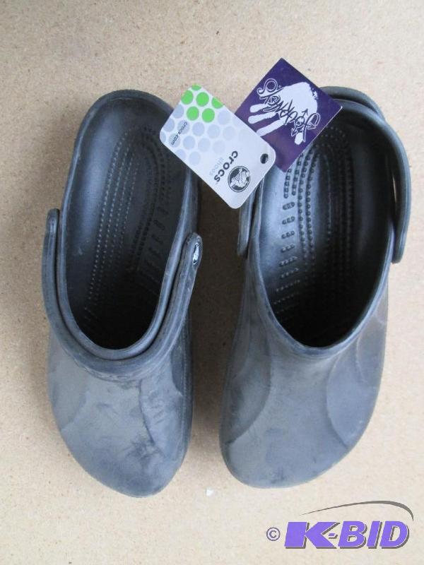 lot 27 image: Brand new pair of Crocs size 11 slip on shoes...