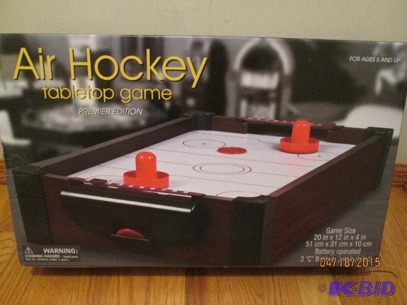 lot 4 image: Air Hockey tabletop game...