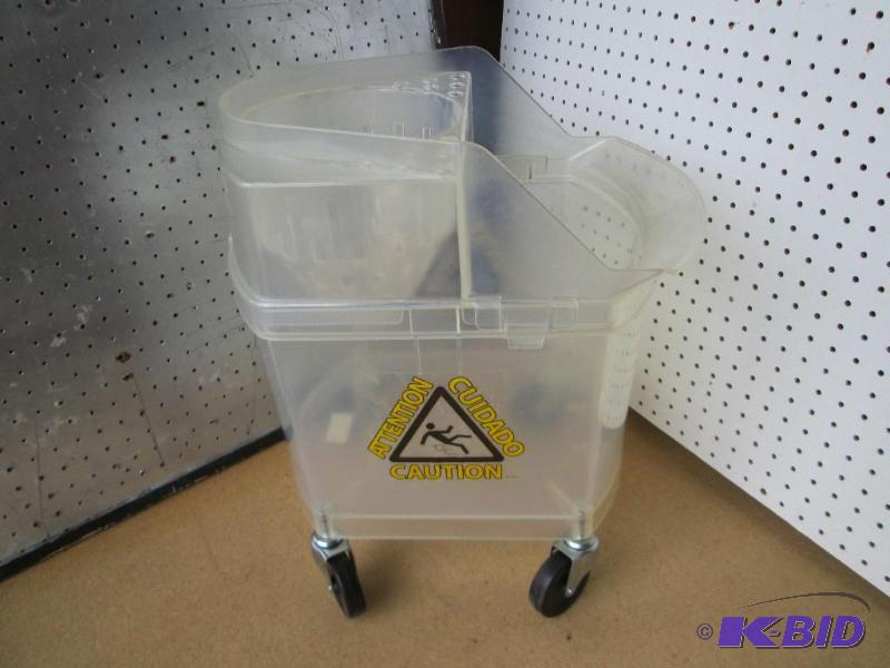 lot 48 image: Brand new commercial mop bucket on caster whe...
