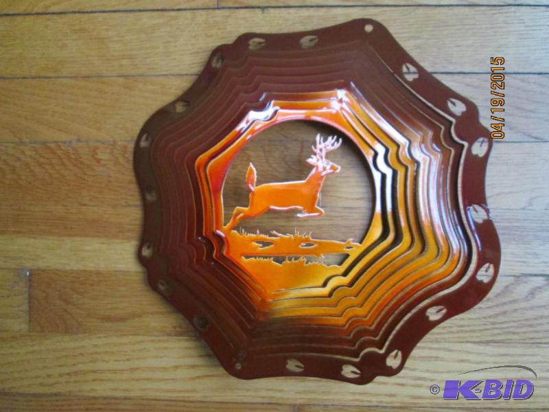 lot 96 image: Metal wind spinner featuring a deer running, ...