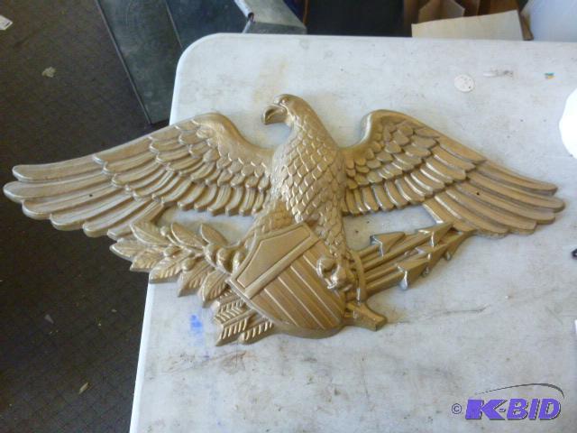 lot 32 image: Plastic Eagle Wall Decor 31"...